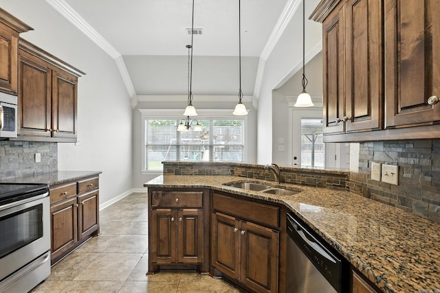 6137 Remington Dr, Bryant, AR 72022 - kitchen featuring appliances with stainless steel finishes, ornamental molding, tasteful backsplash, dark stone countertops, and hanging light fixtures