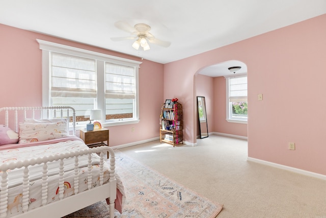 120 Crystal Ct, Little Rock, AR 72205 - bedroom with arched walkways, carpet, and a ceiling fan