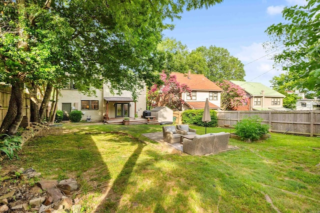 120 Crystal Ct, Little Rock, AR 72205 - fenced backyard featuring french doors and an outdoor hangout area