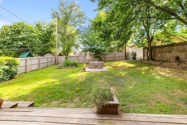 120 Crystal Ct, Little Rock, AR 72205 - fenced backyard with a wooden deck and a garden