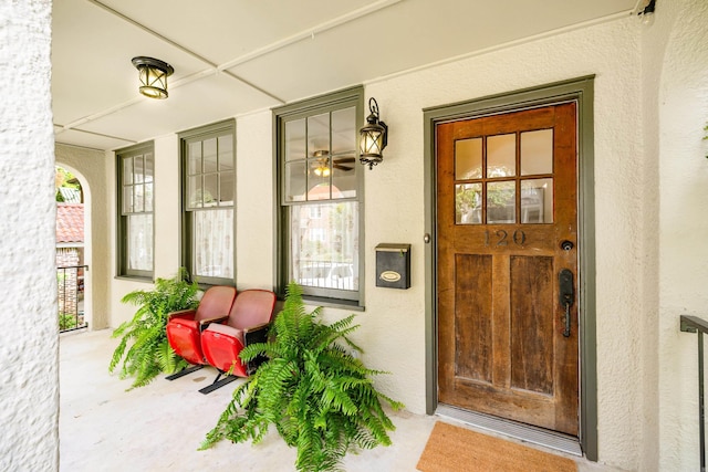 120 Crystal Ct, Little Rock, AR 72205 - view of exterior entry featuring covered porch and stucco siding