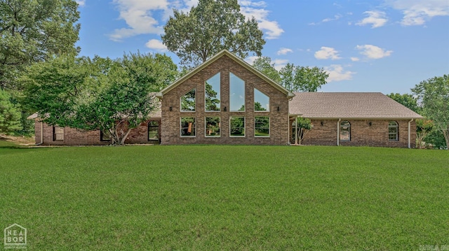 5510 Crowleys Ridge Rd, Jonesboro, AR 72404 - mid-century modern home featuring a front yard and brick siding