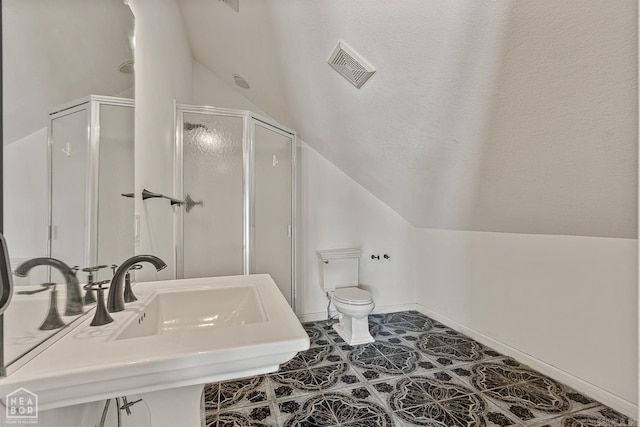 5510 Crowleys Ridge Rd, Jonesboro, AR 72404 - bathroom with vaulted ceiling, a shower stall, and tile patterned flooring