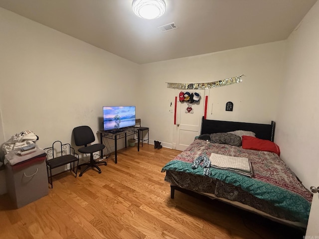 3000 S Cherry St, Pine Bluff, AR 71603 - bedroom with wood finished floors