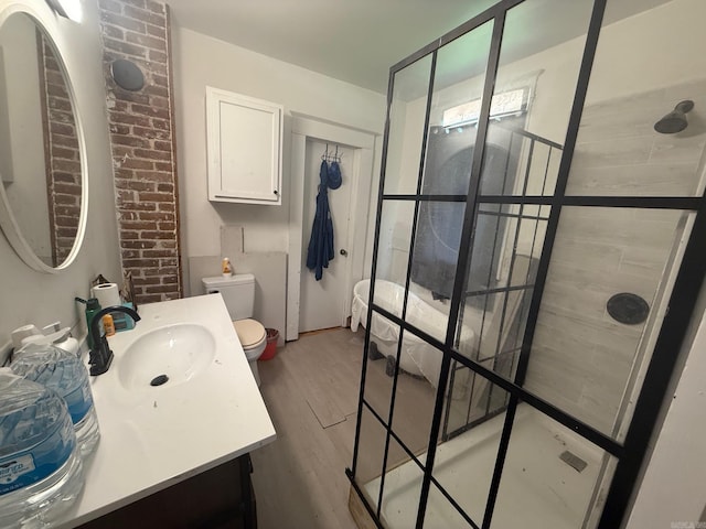 3000 S Cherry St, Pine Bluff, AR 71603 - full bath featuring walk in shower, vanity, and wood finished floors