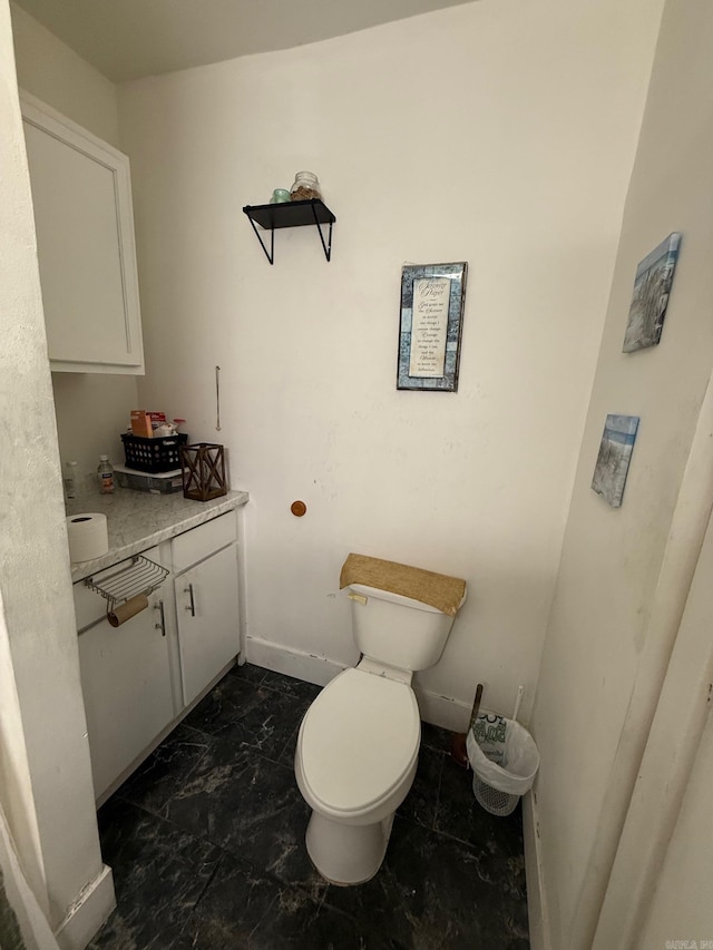 3000 S Cherry St, Pine Bluff, AR 71603 - half bath featuring toilet and baseboards