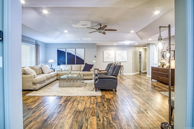 23 Emanuel Dr, Hot Springs Village, AR 71909 - living room featuring a tray ceiling, wood finished floors, a ceiling fan, and recessed lighting