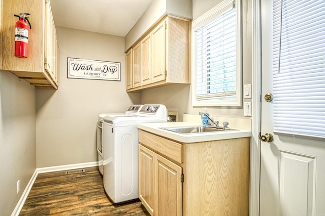 23 Emanuel Dr, Hot Springs Village, AR 71909 - washroom with cabinet space, washer and dryer, dark wood-type flooring, and plenty of natural light