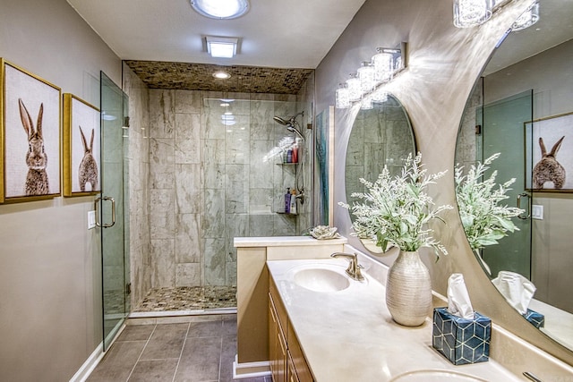 23 Emanuel Dr, Hot Springs Village, AR 71909 - bathroom with a stall shower, double vanity, and tile patterned flooring