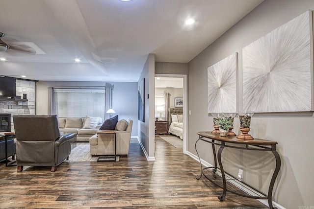 23 Emanuel Dr, Hot Springs Village, AR 71909 - living room featuring dark wood finished floors, a ceiling fan, and recessed lighting