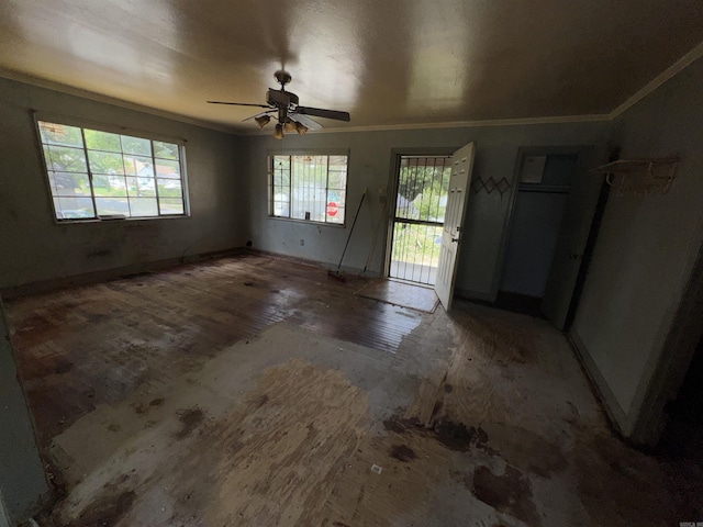 600 S Maple St, Little Rock, AR 72205 - empty room featuring crown molding, ceiling fan, and wood finished floors
