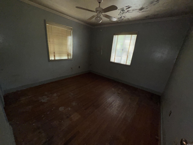 600 S Maple St, Little Rock, AR 72205 - unfurnished room with crown molding, dark wood-style flooring, and a ceiling fan