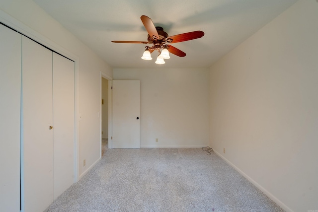 2128 Yamania Way, Heber Springs, AR 72543 - unfurnished bedroom featuring carpet floors, a closet, and a ceiling fan