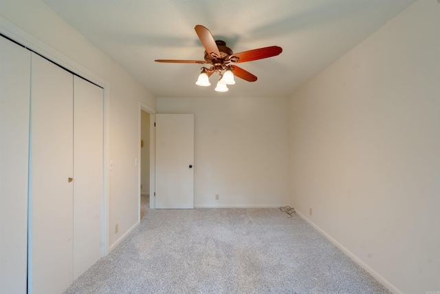 2128 Yamania Way, Heber Springs, AR 72543 - unfurnished bedroom with carpet floors, a closet, and a ceiling fan