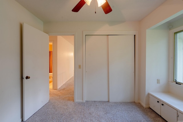 2128 Yamania Way, Heber Springs, AR 72543 - unfurnished bedroom featuring carpet flooring, a closet, and a ceiling fan