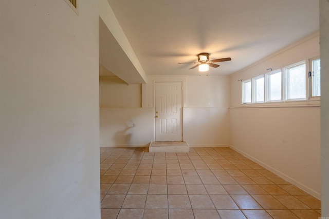 2128 Yamania Way, Heber Springs, AR 72543 - unfurnished room featuring a ceiling fan, light tile patterned floors, and ornamental molding