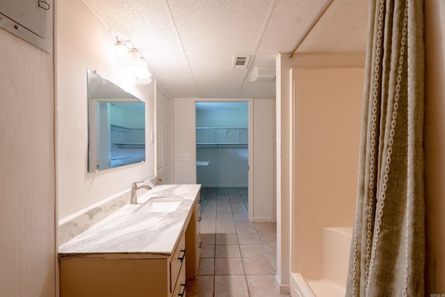 2128 Yamania Way, Heber Springs, AR 72543 - bathroom with vanity, tile patterned floors, and a paneled ceiling