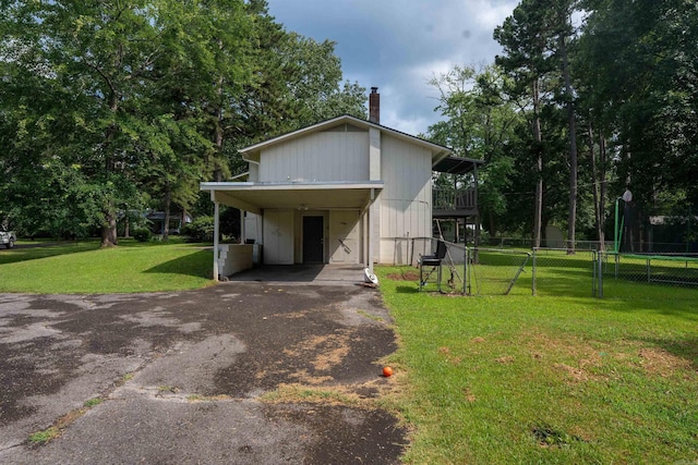 2128 Yamania Way, Heber Springs, AR 72543 - view of outdoor structure featuring asphalt driveway and a carport
