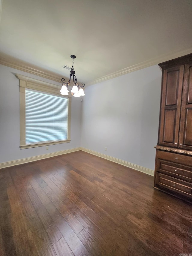 140 Bentley Cir, Little Rock, AR 72210 - empty room with a chandelier, crown molding, and dark wood finished floors