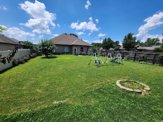 140 Bentley Cir, Little Rock, AR 72210 - fenced backyard with a playground