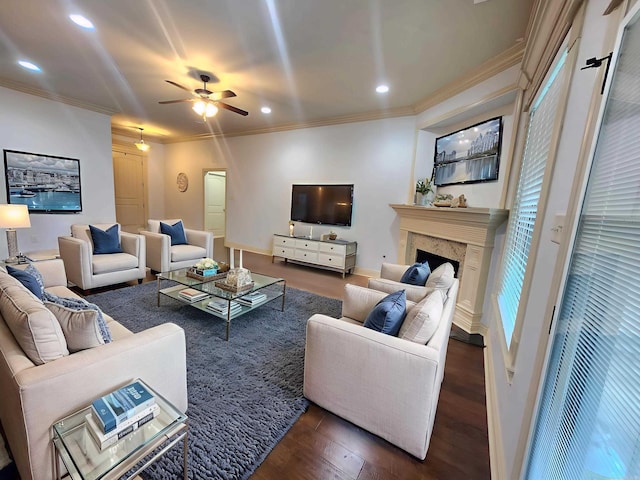 140 Bentley Cir, Little Rock, AR 72210 - living area with dark wood-type flooring, a ceiling fan, crown molding, a high end fireplace, and recessed lighting