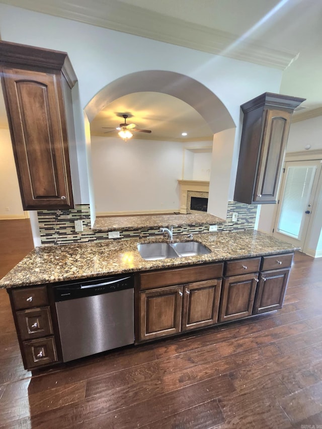 140 Bentley Cir, Little Rock, AR 72210 - kitchen featuring stainless steel dishwasher, ceiling fan, arched walkways, stone counters, and crown molding