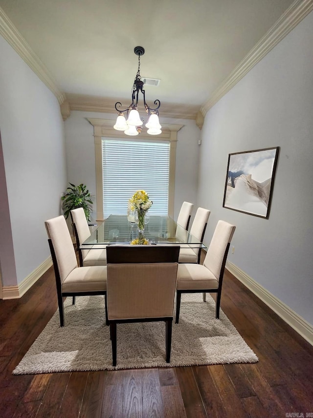140 Bentley Cir, Little Rock, AR 72210 - dining room featuring crown molding, wood finished floors, and a chandelier