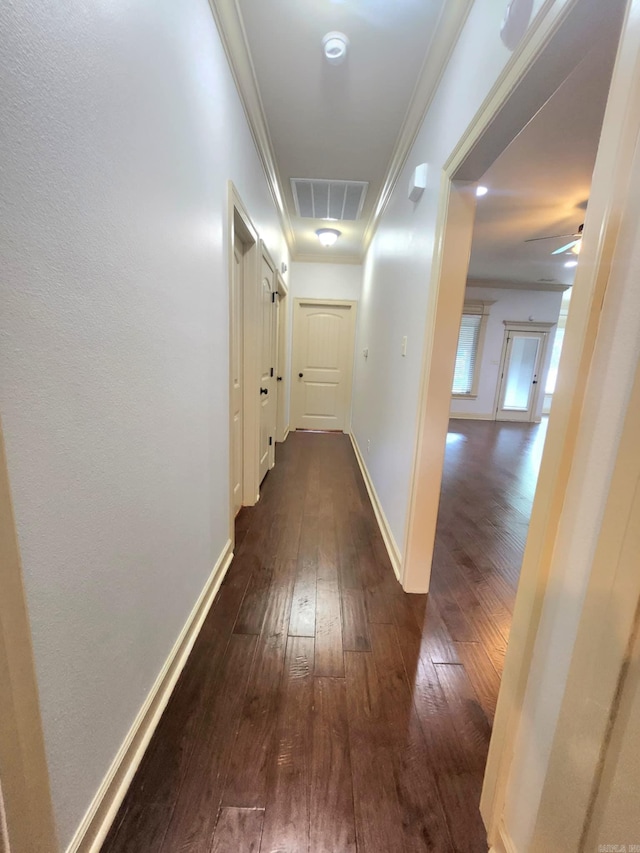 140 Bentley Cir, Little Rock, AR 72210 - hallway featuring dark wood-type flooring and ornamental molding