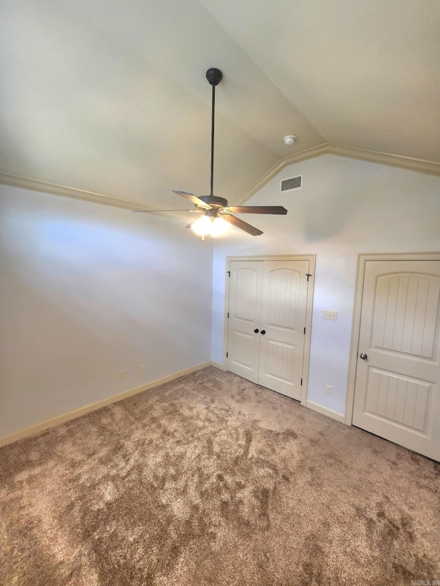 140 Bentley Cir, Little Rock, AR 72210 - unfurnished bedroom featuring carpet, lofted ceiling, and a ceiling fan