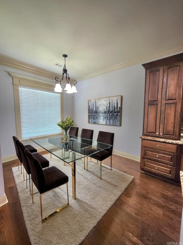 140 Bentley Cir, Little Rock, AR 72210 - dining room with a chandelier, ornamental molding, and dark wood-style flooring