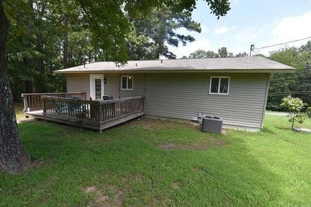242 Lakeview Dr, Fairfield Bay, AR 72088 - rear view of property with a lawn and a deck