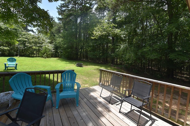 242 Lakeview Dr, Fairfield Bay, AR 72088 - wooden terrace featuring a fire pit and a yard