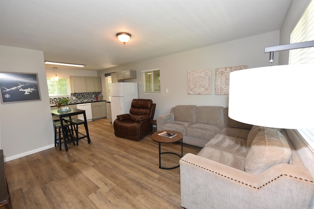 242 Lakeview Dr, Fairfield Bay, AR 72088 - living area featuring light wood-type flooring and baseboards