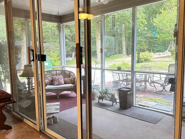 67 Powhatan Dr, Cherokee Village, AR 72529 - doorway with carpet floors and tile patterned floors