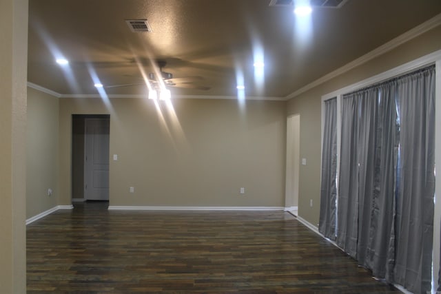 1300 W 28th Ave, Pine Bluff, AR 71603 - unfurnished room with a ceiling fan, dark wood-type flooring, ornamental molding, and recessed lighting