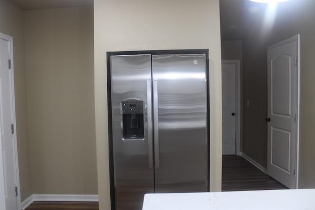 1300 W 28th Ave, Pine Bluff, AR 71603 - kitchen featuring stainless steel fridge with ice dispenser and dark wood-style floors