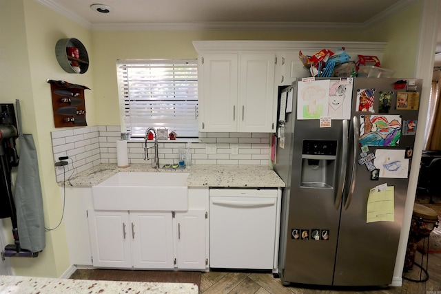 34 Ridge Rd, Cabot, AR 72023 - kitchen with stainless steel fridge, dishwasher, white cabinets, crown molding, and backsplash
