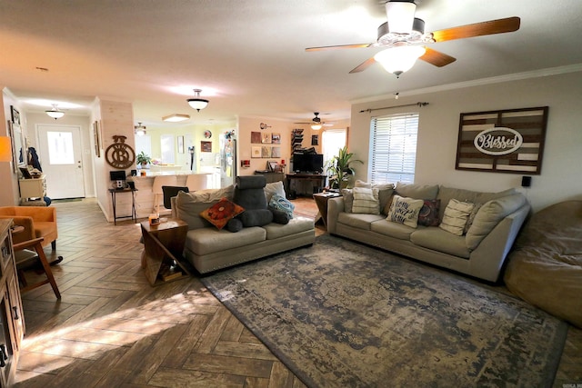 34 Ridge Rd, Cabot, AR 72023 - living area with ceiling fan, healthy amount of natural light, and ornamental molding