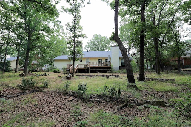 34 Ridge Rd, Cabot, AR 72023 - back of house with a wooden deck, a chimney, and stairs