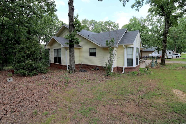 34 Ridge Rd, Cabot, AR 72023 - view of side of home with a shingled roof