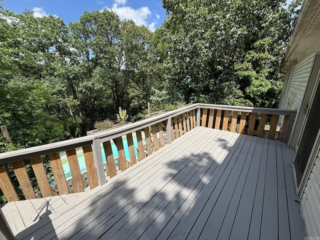 11220 Bainbridge Dr, Little Rock, AR 72212 - wooden deck featuring a swimming pool