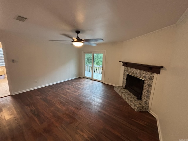 11220 Bainbridge Dr, Little Rock, AR 72212 - unfurnished living room featuring dark wood finished floors, ceiling fan, crown molding, and a high end fireplace
