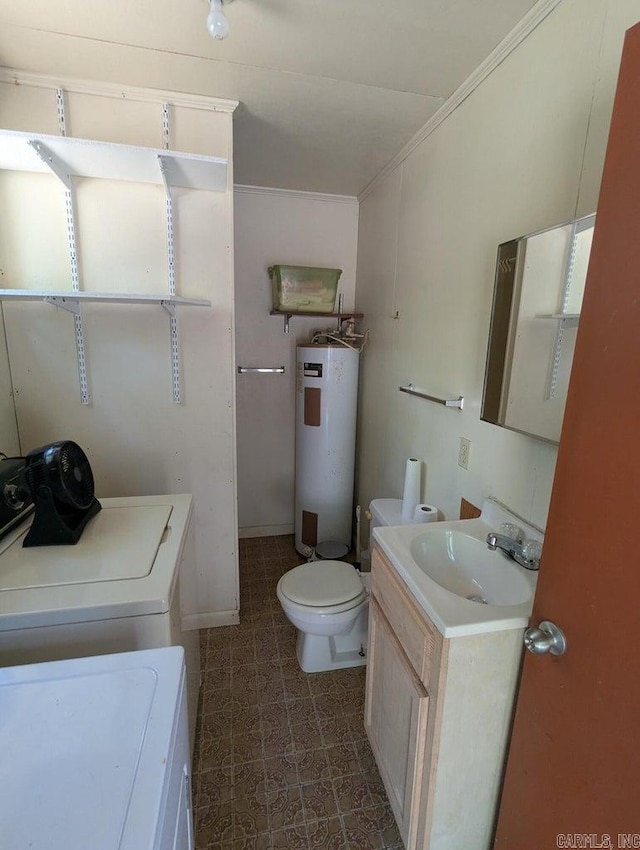 100 Osage, Edgemont, AR 72044 - half bathroom with water heater, washer / dryer, vanity, tile patterned floors, and crown molding