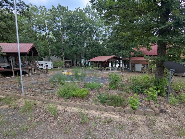 100 Osage, Edgemont, AR 72044 - view of yard featuring a shed