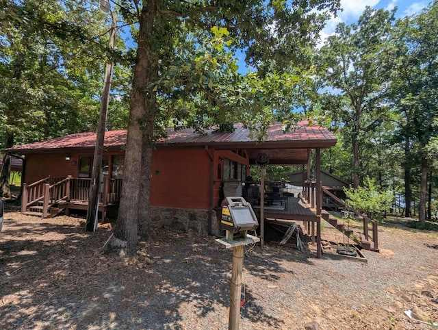 100 Osage, Edgemont, AR 72044 - rear view of property with a metal roof and a deck