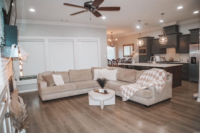 4321 Sloan Dr, Bryant, AR 72002 - living area with ceiling fan, a chandelier, dark wood-style floors, recessed lighting, and ornamental molding