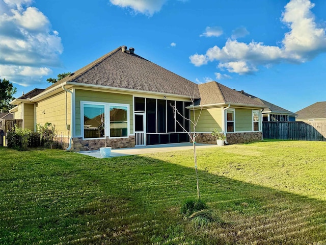 4321 Sloan Dr, Bryant, AR 72002 - back of property with stone siding, a sunroom, and a shingled roof