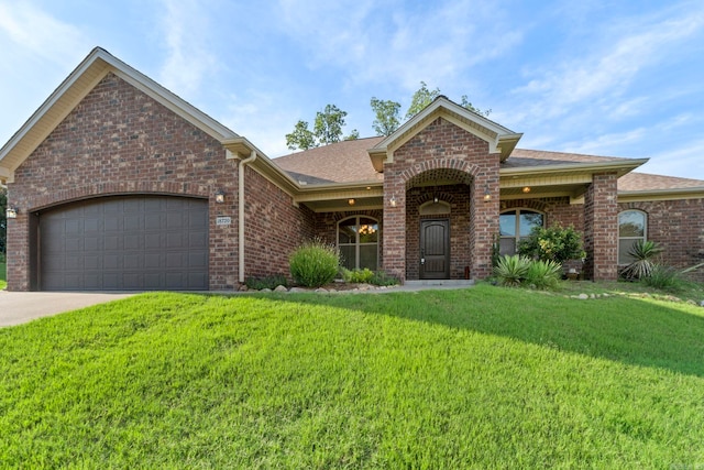 18720 Lochridge Dr, Little Rock, AR 72210 - view of front of home with brick siding, a front yard, and an attached garage