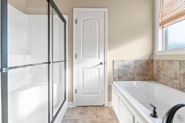 18720 Lochridge Dr, Little Rock, AR 72210 - bathroom with a stall shower and a garden tub