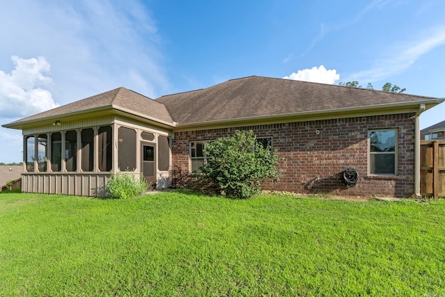 18720 Lochridge Dr, Little Rock, AR 72210 - rear view of property with a sunroom, roof with shingles, and brick siding